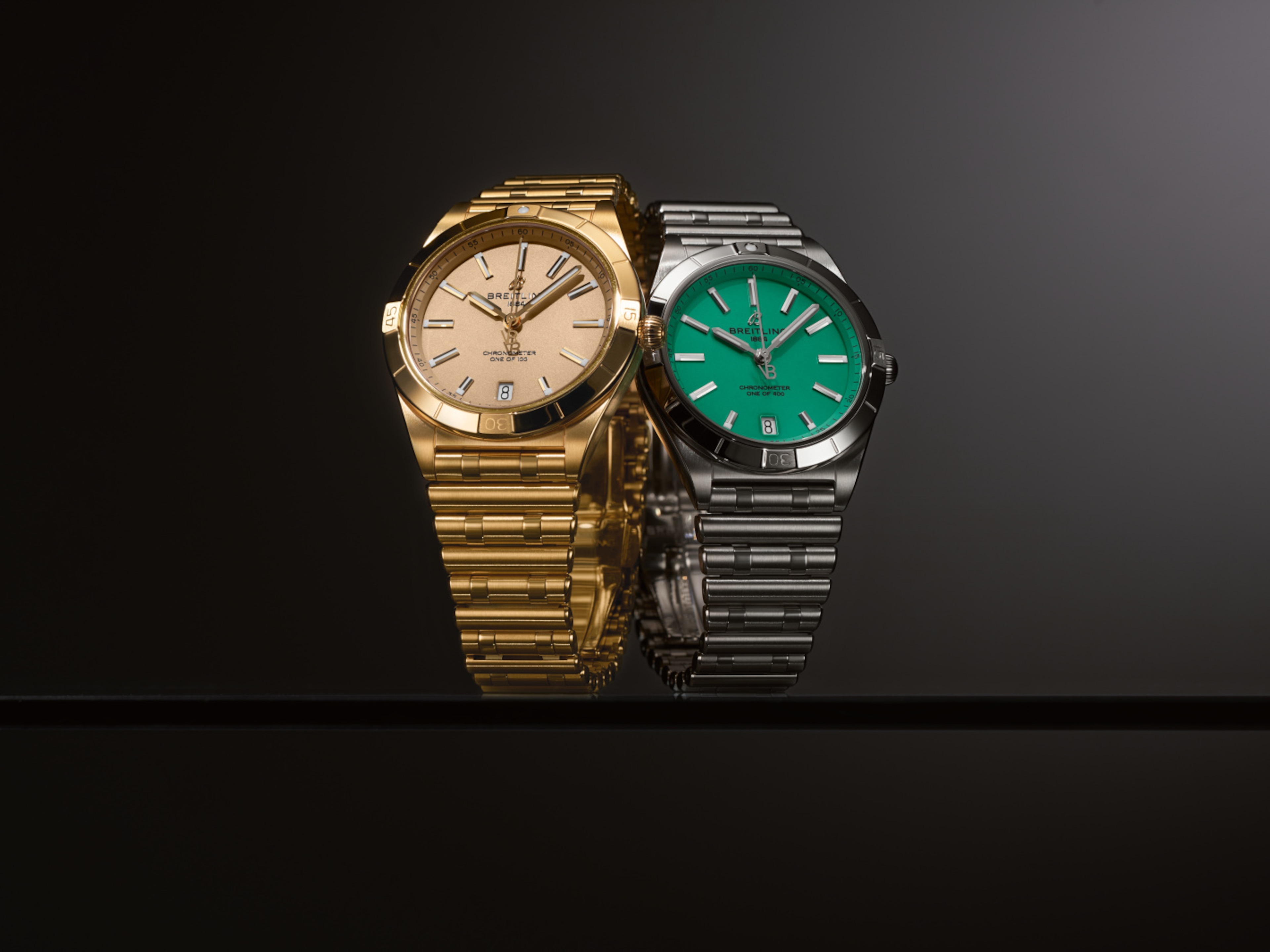 Two Victoria Beckham Breitling Chronomat 36 watches in yellow gold and steel