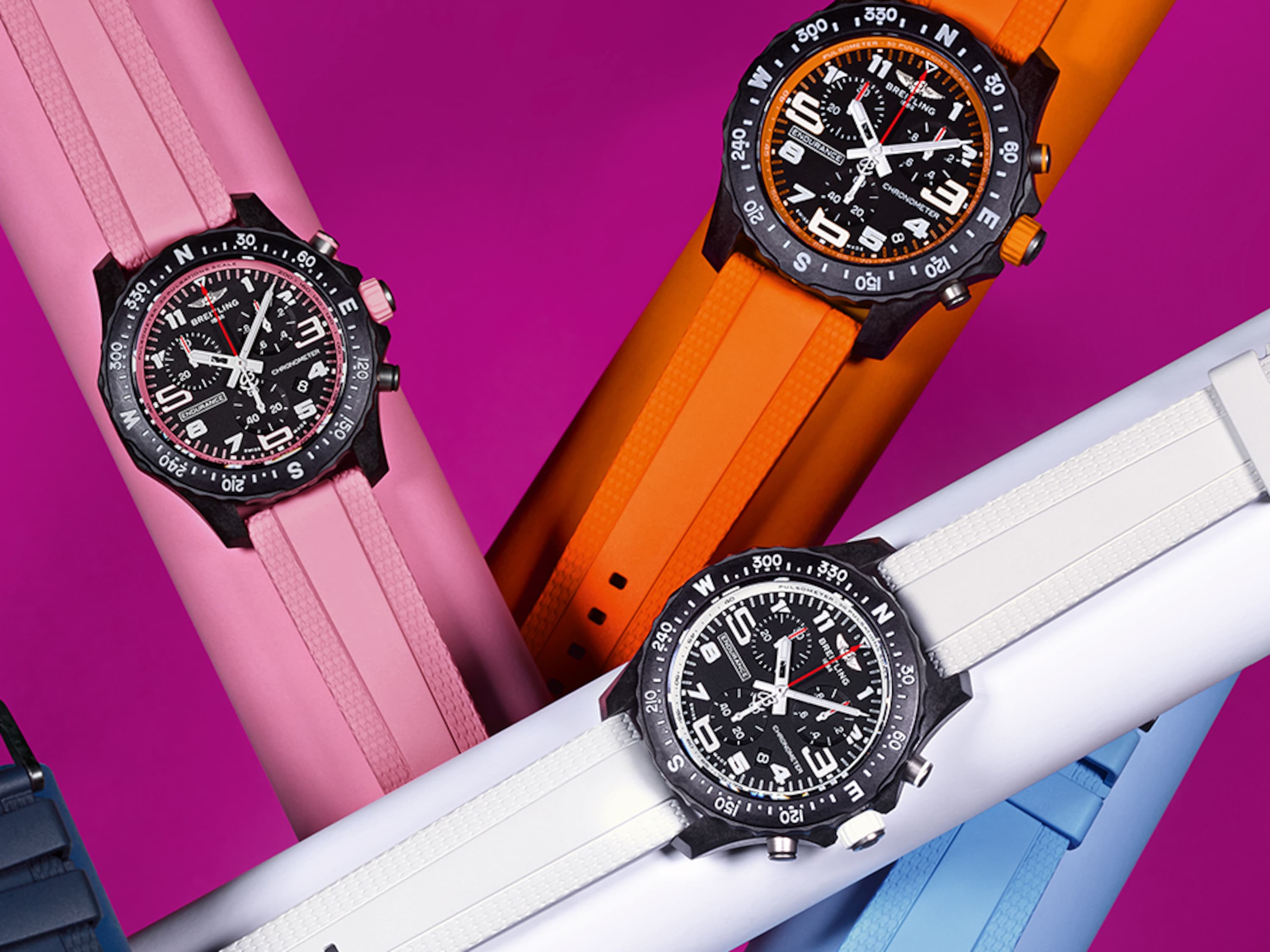 Seis relojes Endurance Pro en rosa, naranja, blanco, azul claro, azul claro, azul oscuro y morado.