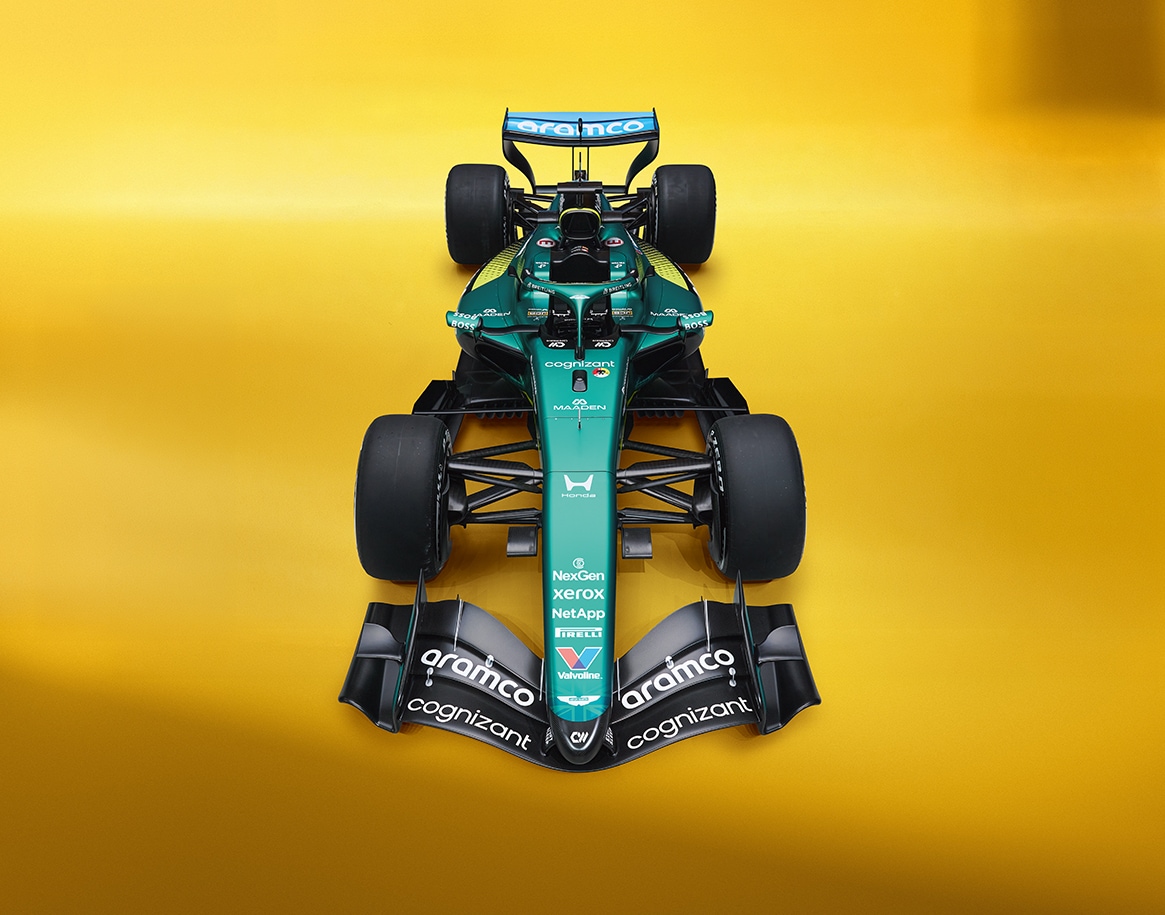 {generated} Breitling Navitimer for the Aston Martin partnership shown on a vivid yellow backdrop with a sporty black strap