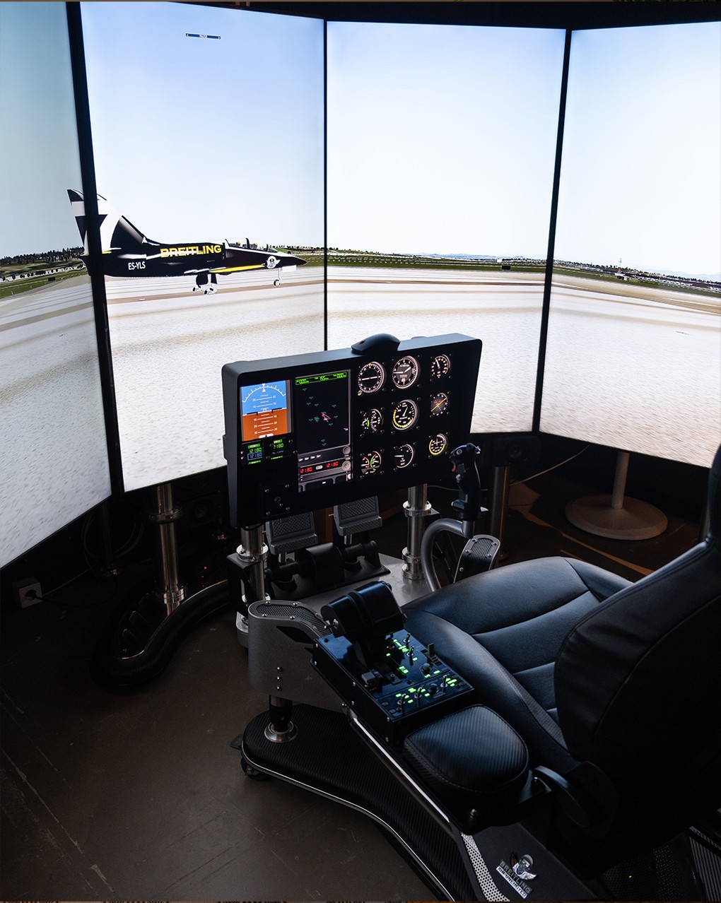 {generated} Advanced flight simulator setup displaying a Breitling-branded aircraft on panoramic screens with detailed cockpit controls
