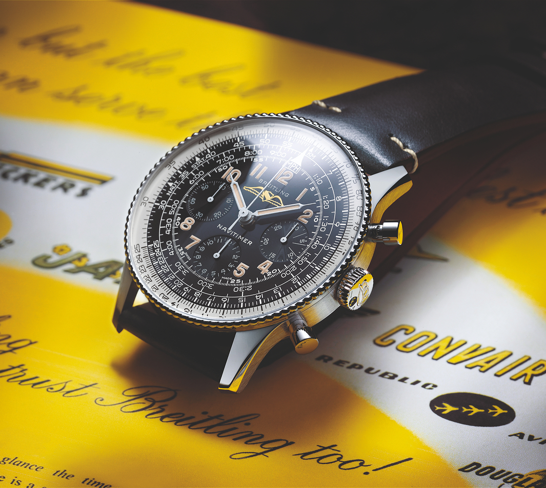{generated} ヴィンテージ航空グラフィック上のBreitlingナビタイマーで、黒い文字盤や回転計算尺、レザーストラップを強調