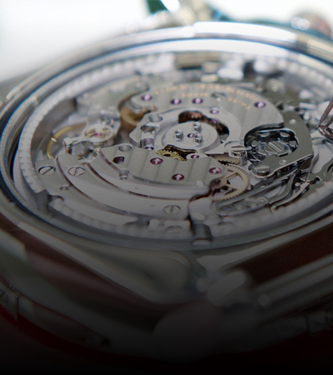 {generated} Breitling watch movement inspected with fine tools while a technician conducts precise certified maintenance procedures