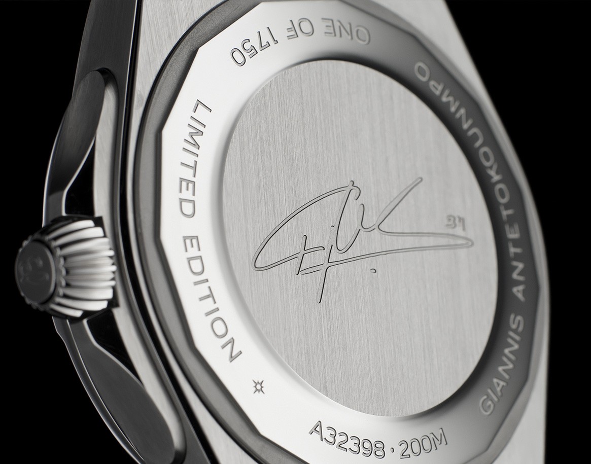 {generated} Breitling limited‑edition caseback with Giannis Antetokounmpo’s engraved signature and precise model markings in steel