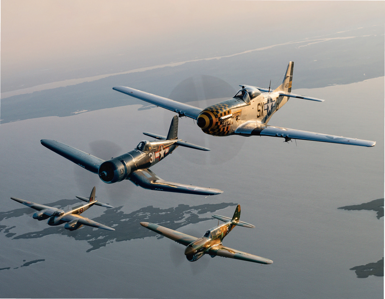 {generated} Vintage aircraft in tight formation over calm coastline, evoking Breitling Classic Avi’s aviation heritage.