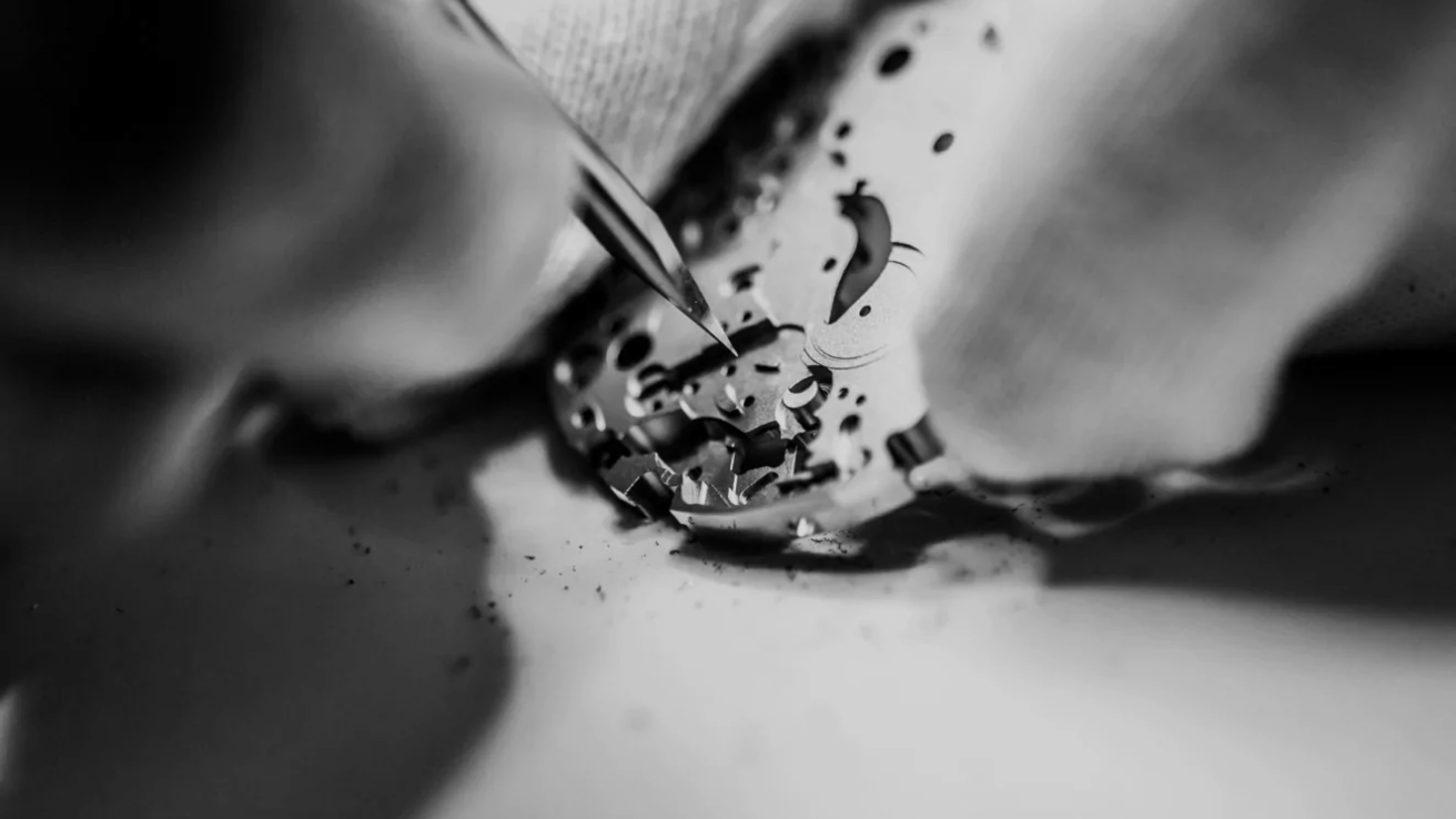 {generated} Detailed view of a technician adjusting intricate watch movement components, highlighting meticulous Breitling service craft.