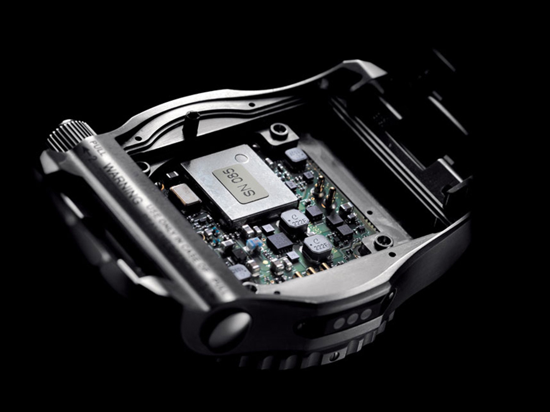 {generated} Detailed macro view of the Breitling Emergency watch’s internal electronic module highlighting precision components.