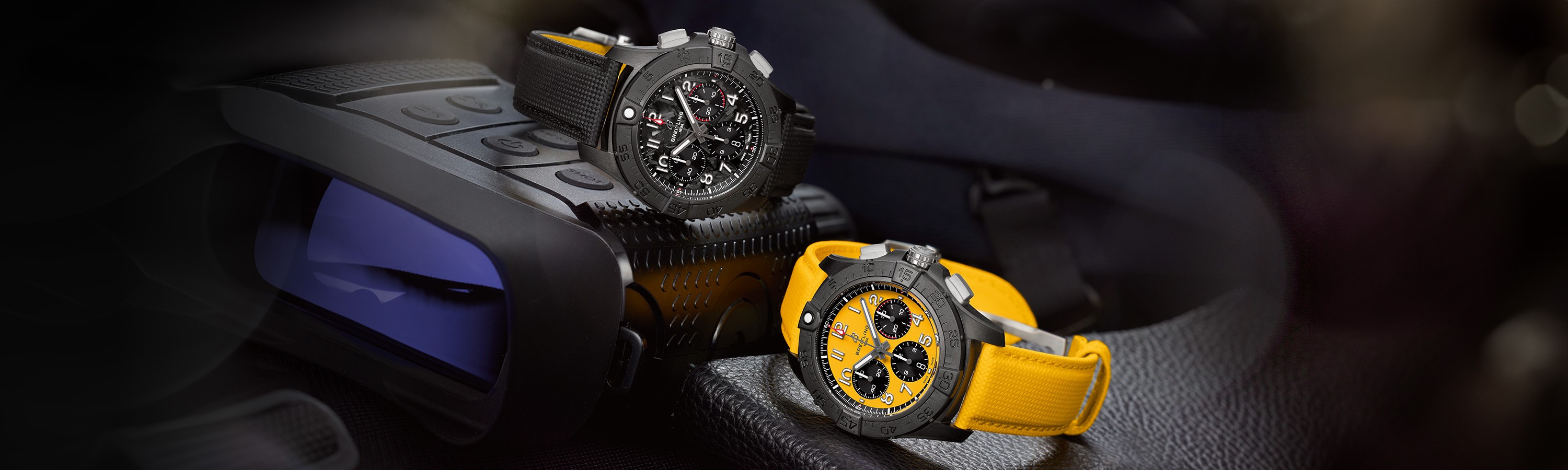 {generated} Breitling陶瓷計時腕錶以黑色與黃色錶帶放置於堅固裝備上展現鮮明的技術氛圍