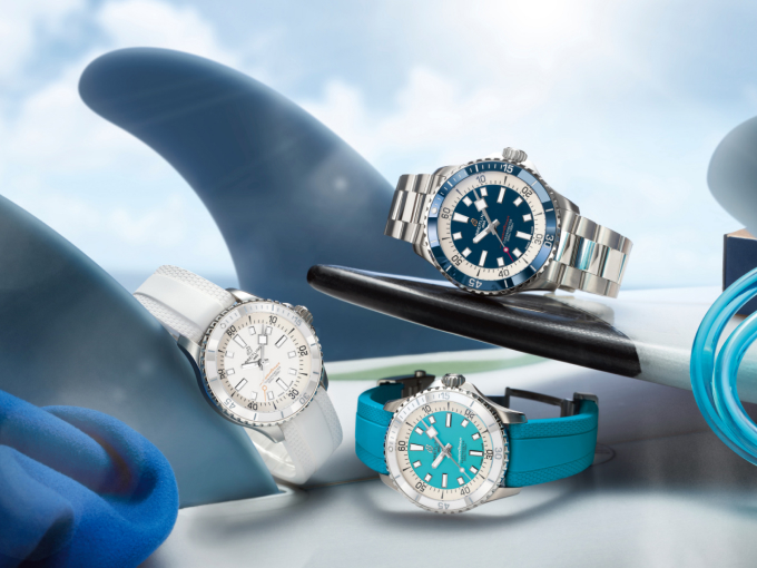 {generated} Breitling watches displayed among stylised ocean fins, showcasing vivid dials and straps within a striking aquatic scene.