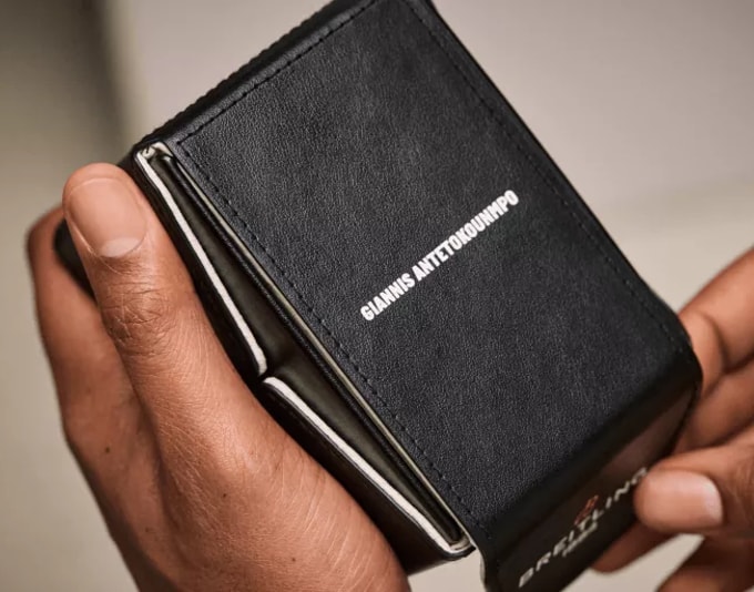 {generated} Breitling limited‑edition caseback with Giannis Antetokounmpo’s engraved signature and precise model markings in steel