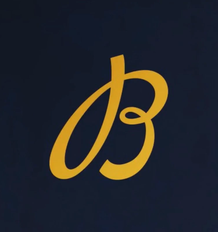 {generated} Logo calligrafico dorato Breitling su sfondo scuro, creando un accento visivo raffinato adatto a contenuti dedicati ai regali
