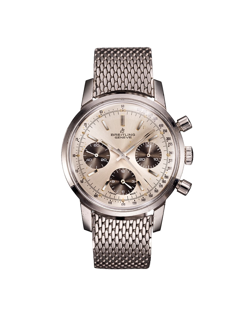 {generated} Breitling Top Time ref. 815 Valjoux 7736 vintage con quadrante argento, contatori scuri e bracciale in maglia d’acciaio