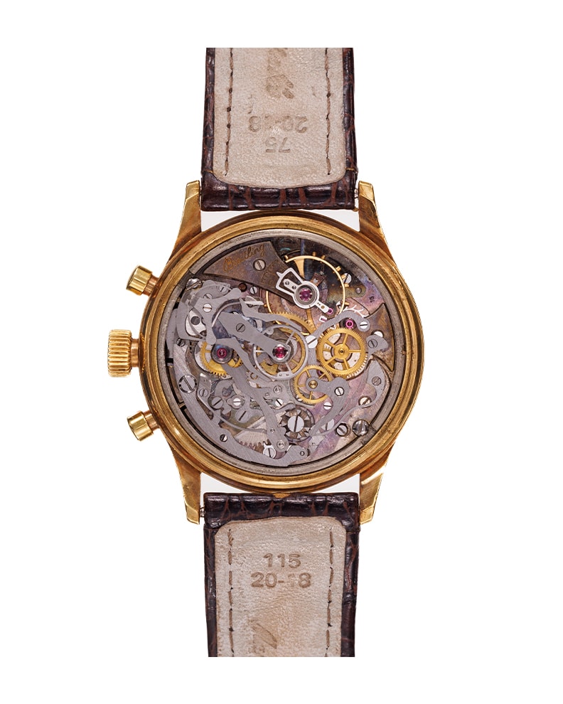 {generated} Vintage Breitling Duograph ref.764 Venus 179 shown with a gold chronograph case, cream dial and brown leather strap.