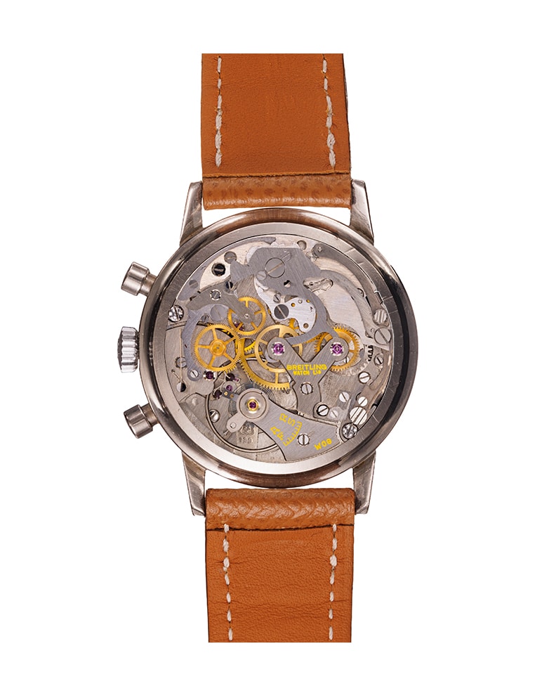 {generated} Breitling Top Time ref.2002 Venus 188 con quadrante nero, contatori argento e cinturino in pelle color cuoio.