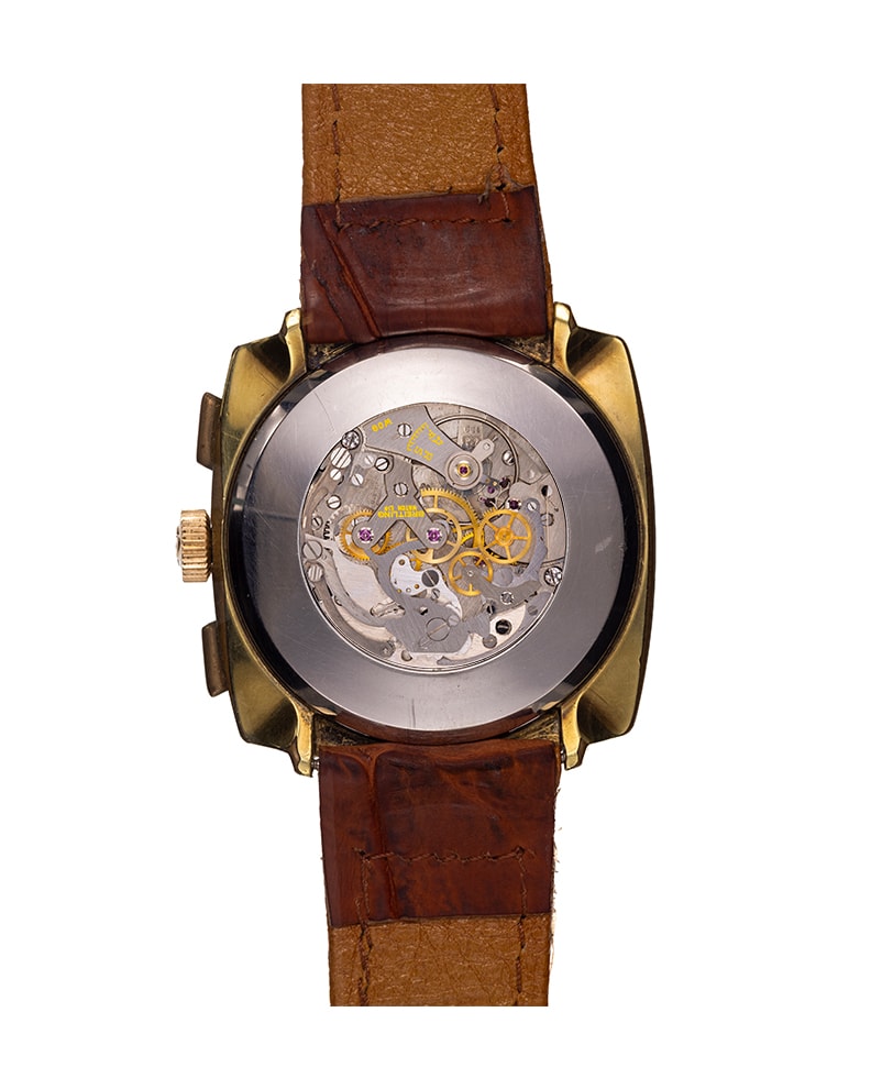 {generated} Orologio vintage Breitling Top Time Square ref. 2009 con cassa dorata, quadrante argento e cinturino in pelle marrone.