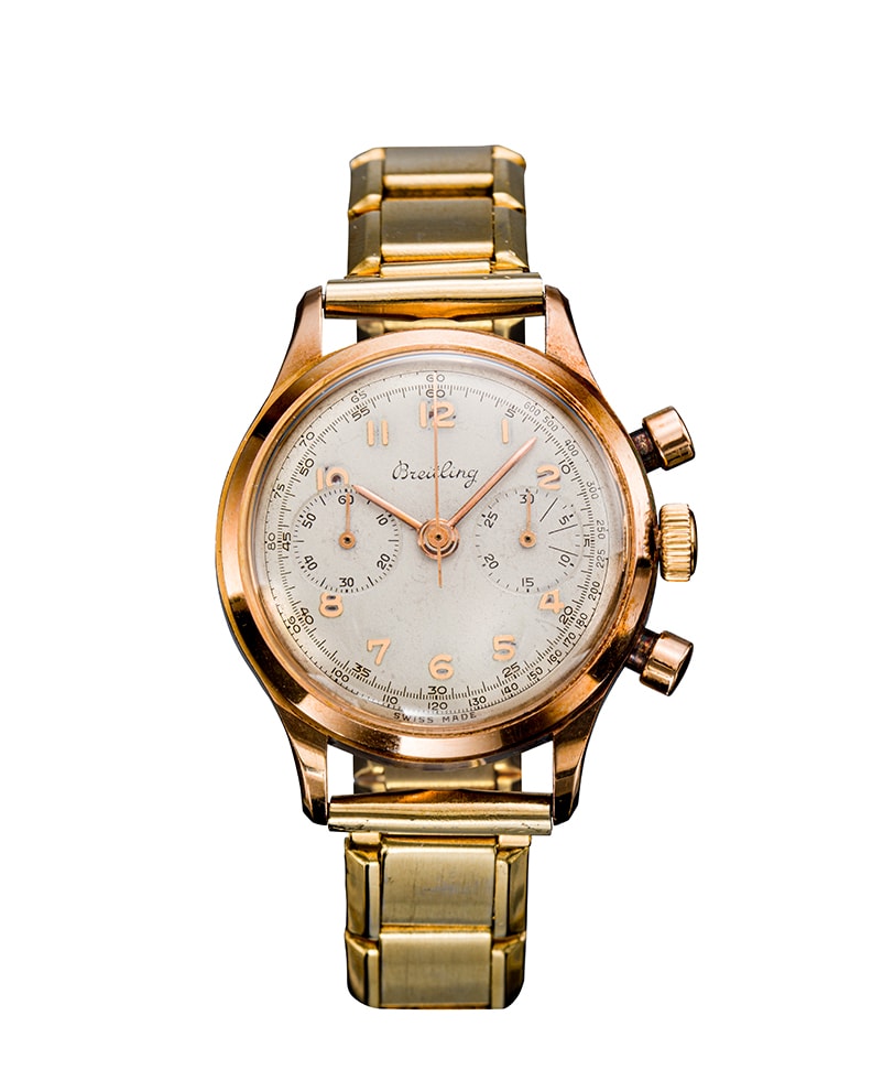 {generated} Vintage Breitling Premier ref.753 Valjoux R69 shown as a gold chronograph watch with a cream dial and linked bracelet