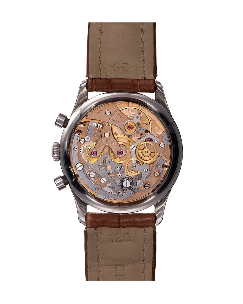 {generated} Breitling Top Time Mk1 ref.810 Venus 178 orologio vintage con quadrante argento, cinturino in pelle marrone e cronografo dettagliato.