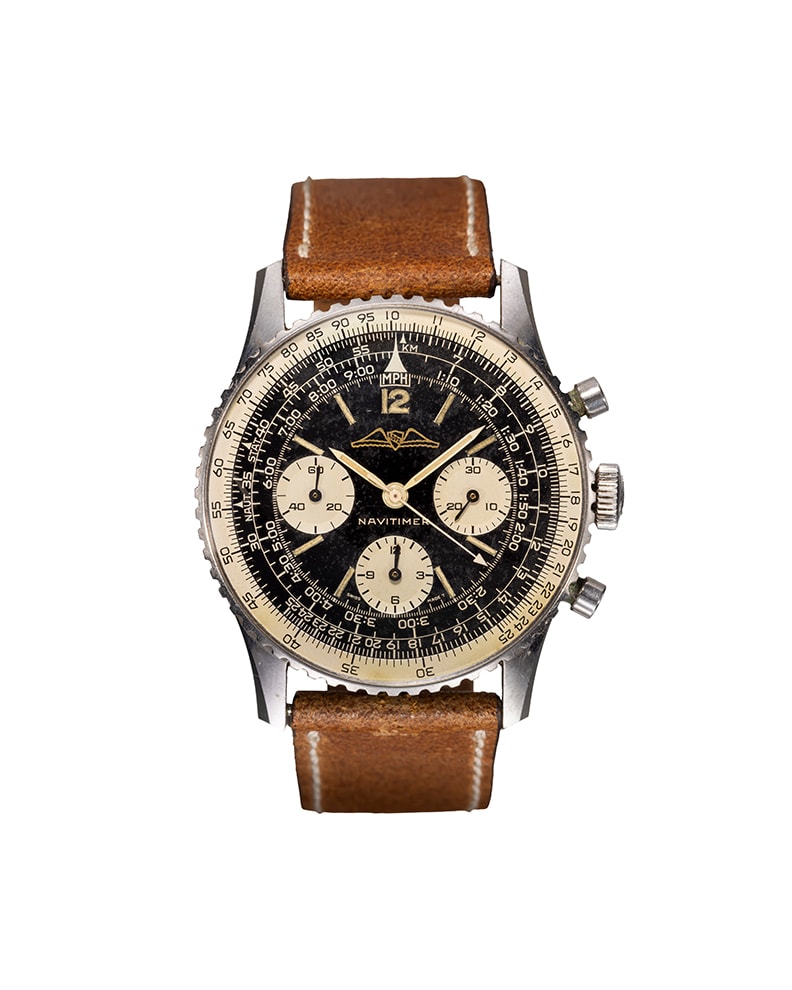 {generated} ブラック文字盤とクリームのサブダイヤルを備えたBreitling Navitimer Mk5 ref.806 Venus 178のブラウンレザーストラップモデル。