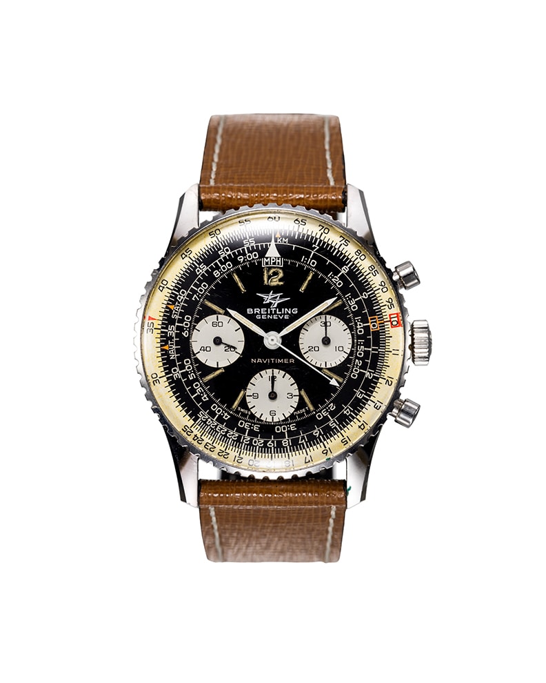 {generated} ヴィンテージのBreitling Navitimer Mk7 ref.806 Venus 178が黒い文字盤とブラウンレザーストラップで正面に示される。