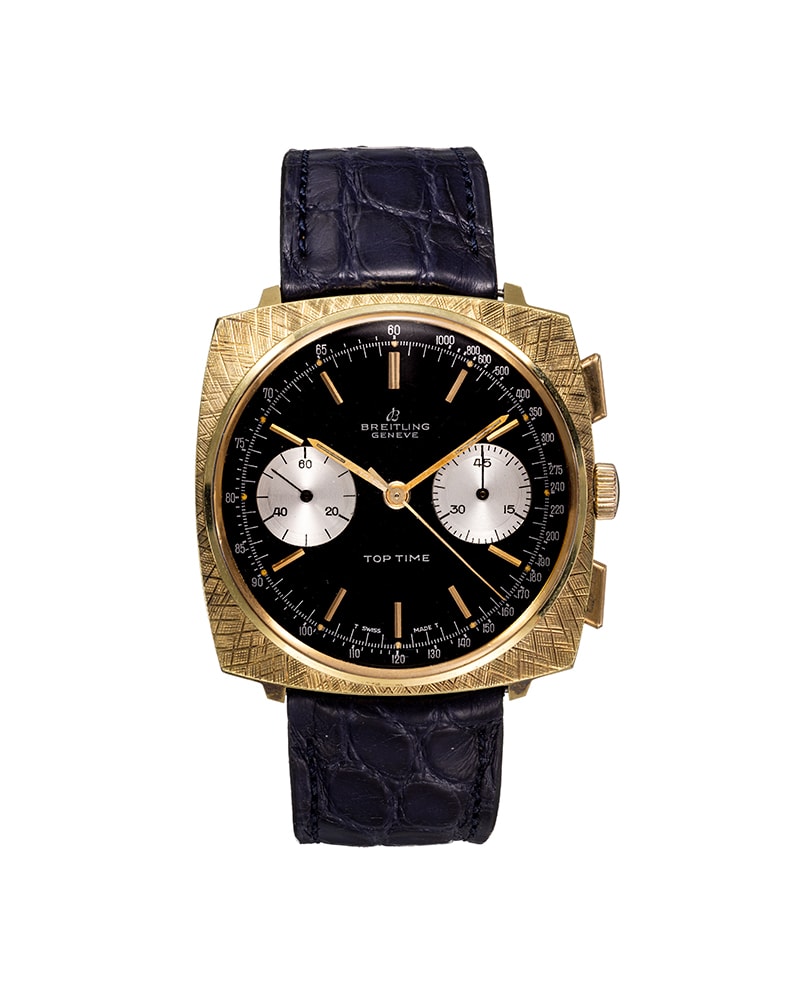 {generated} Breitling Top Time Square ref.2008 Venus188 con cassa dorata incisa, quadrante nero, contatori argento e cinturino in pelle scura