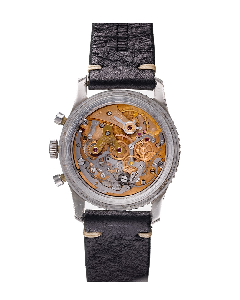 {generated} ヴィンテージBreitlingナビタイマーMk4 ref.806 Venus 178が黒い文字盤とトリコンパックス配置、黒革ストラップで示される。