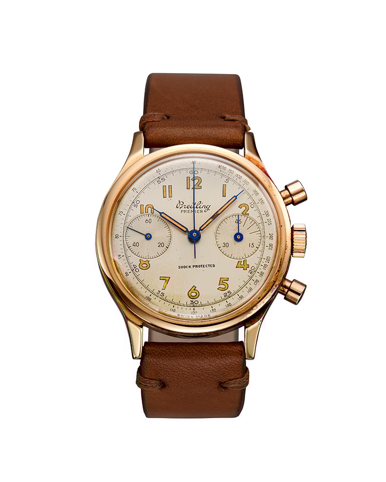 {generated} Breitling Premier ref.790 Venus 150 watch with a gold case, cream dial and brown leather strap shown in a centered view.