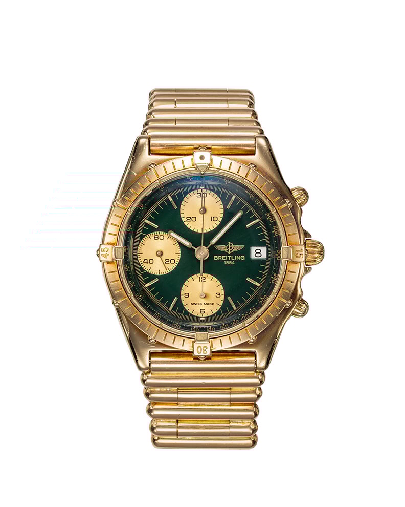 {generated} 金色ケースに緑の文字盤と金属ブレスを備えたBreitling Chronomat ref.81950 V7750が持つクラシックな魅力を表現
