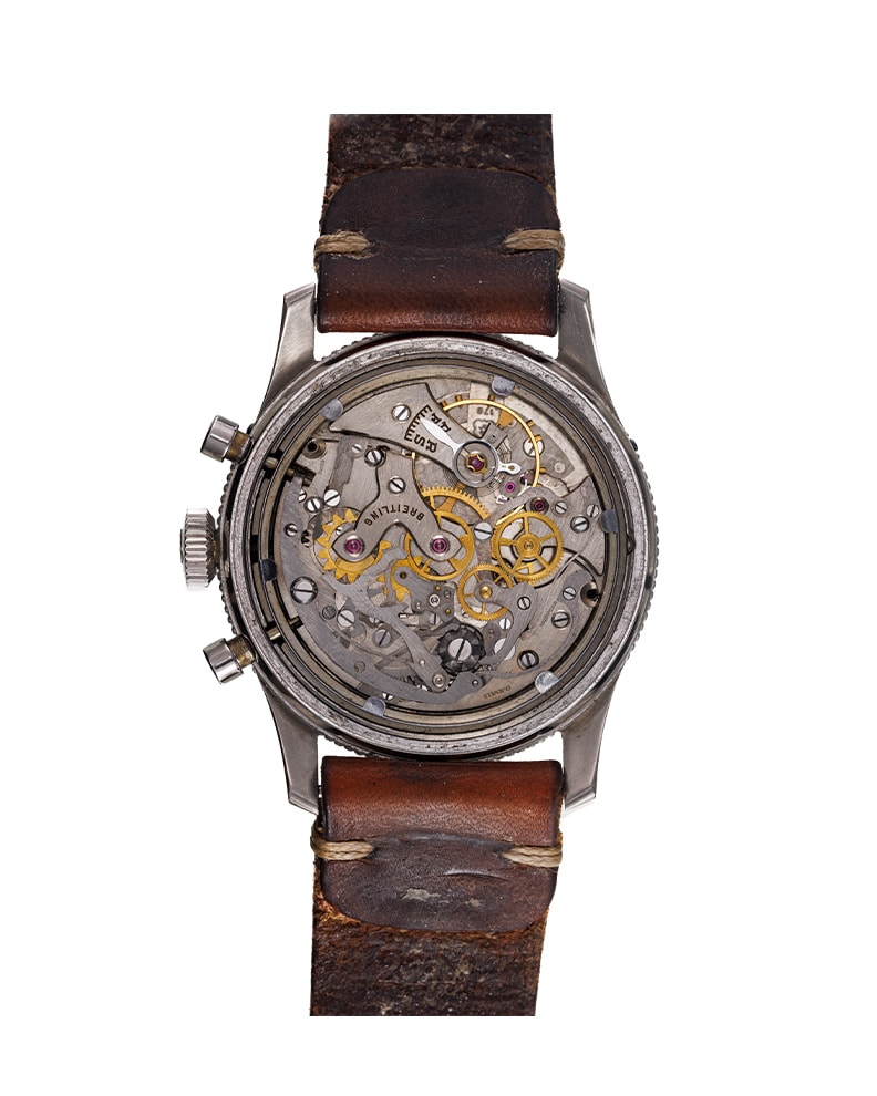 {generated} Breitling Co-Pilot AVI Mk1.1 vintage chronograph featuring a black dial, aged numerals, and a brown leather strap.