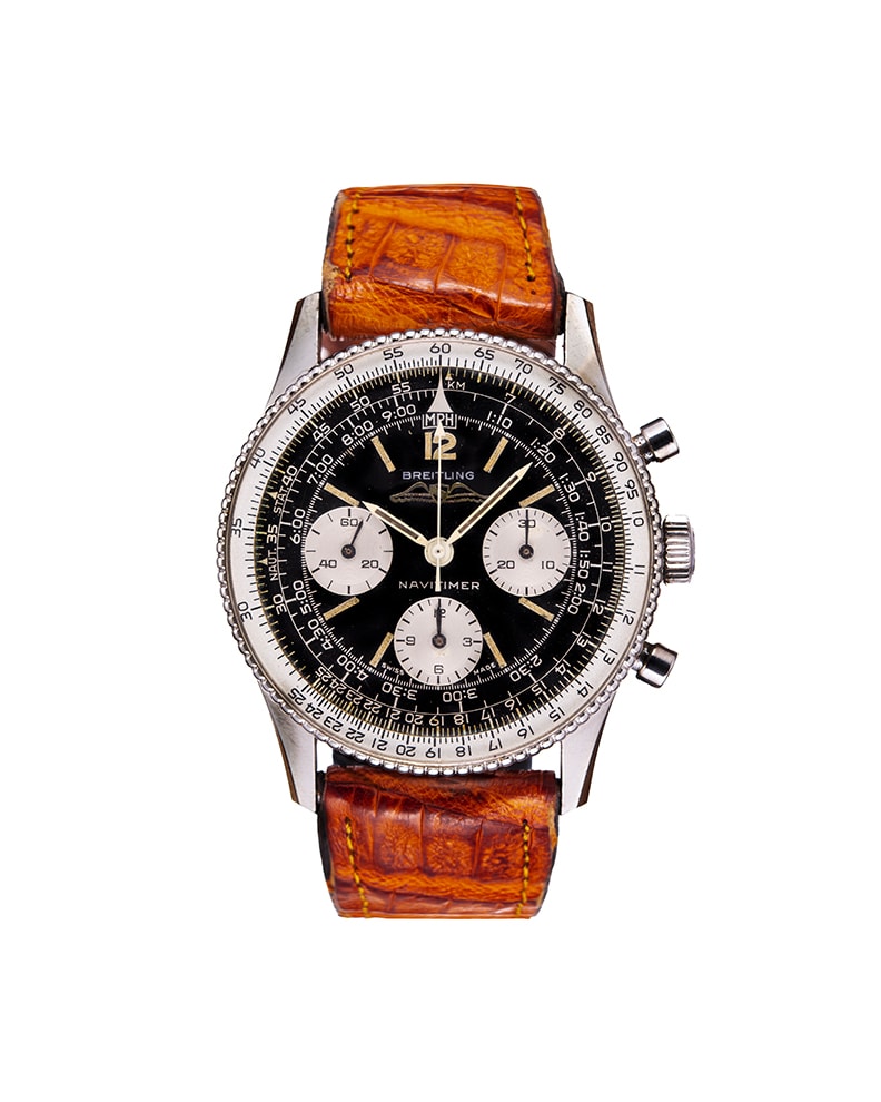 {generated} Breitling Navitimer Mk3.1 ref.806 Venus 178の黒い文字盤と銀色サブダイヤル、茶のレザーストラップを正面から示す構図