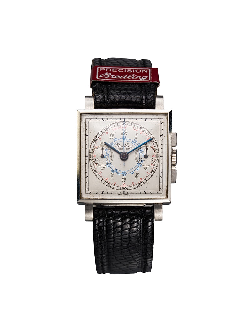 {generated} Vintage Breitling Premier ref.754 Valjoux R69 with square silver case, detailed chronograph dial and black leather strap