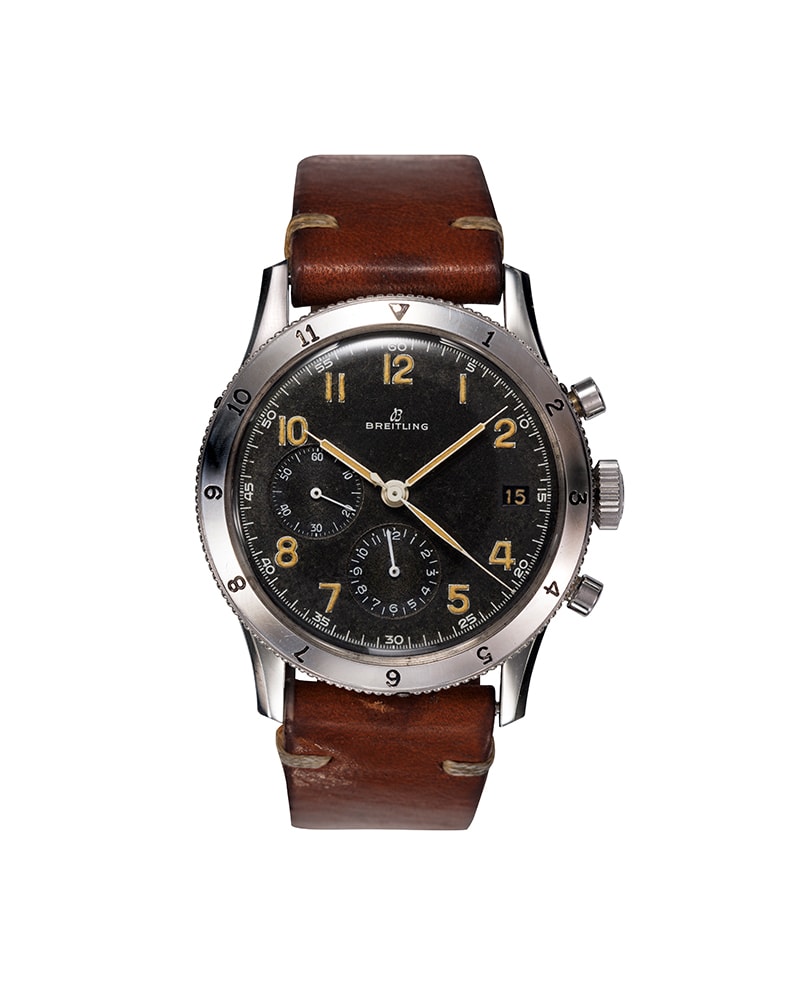 {generated} Breitling Co-Pilot AVI Mk1.1 vintage chronograph featuring a black dial, aged numerals, and a brown leather strap.