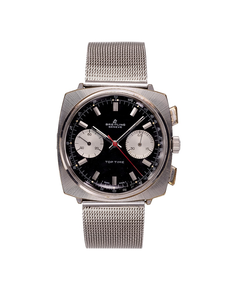 {generated} Breitling Top Time Square ref.2006 con quadrante nero, doppi contatori argento, lancette rosse e bracciale in maglia d’acciaio