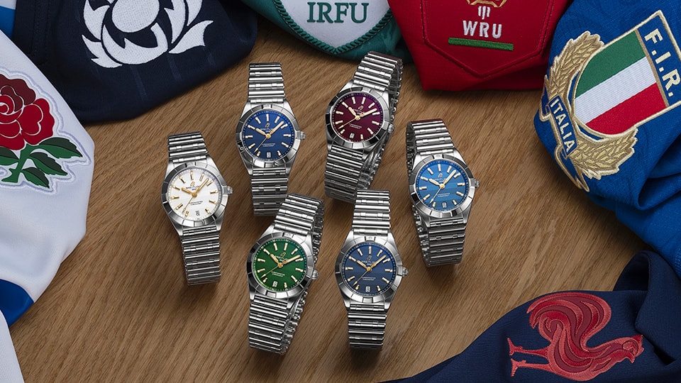 {generated} Breitling Six Nations watches displayed with team‑coloured dials and surrounding rugby crests highlighting each nation