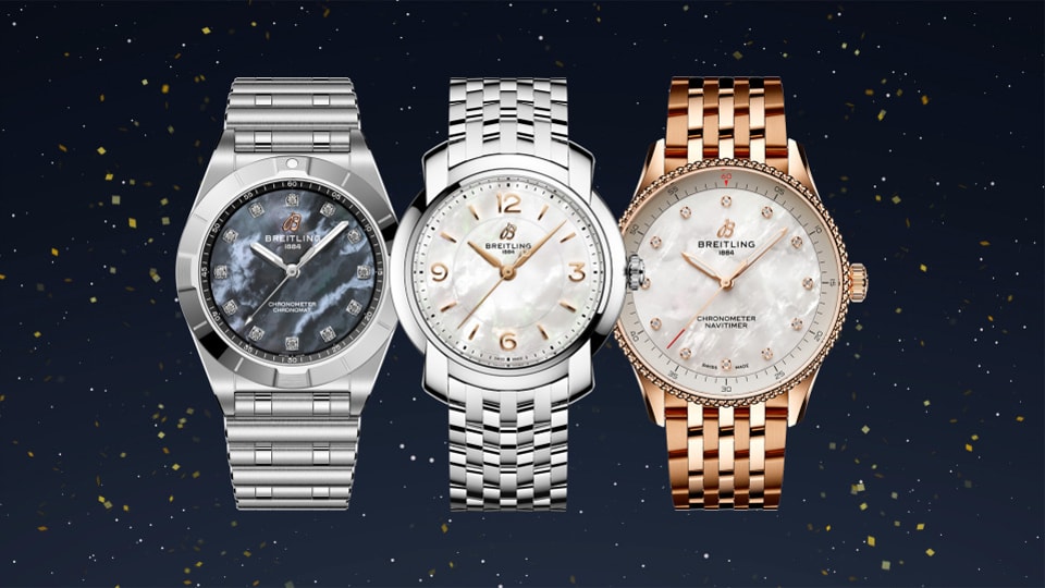 {generated} 3本の女性向けBreitling時計がマザーオブパール文字盤とメタルブレスで並び、暗い祝祭的背景に映える