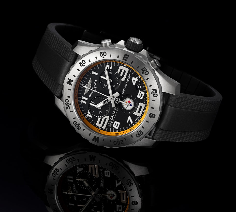 {generated} Breitling Endurance Pro watch with black dial, Steelers detail, and rugged bezel shown in a sleek product display.