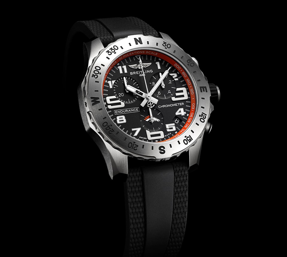 {generated} Breitling Endurance watch with black dial, Denver Broncos detail and red accents, shown with a textured black strap