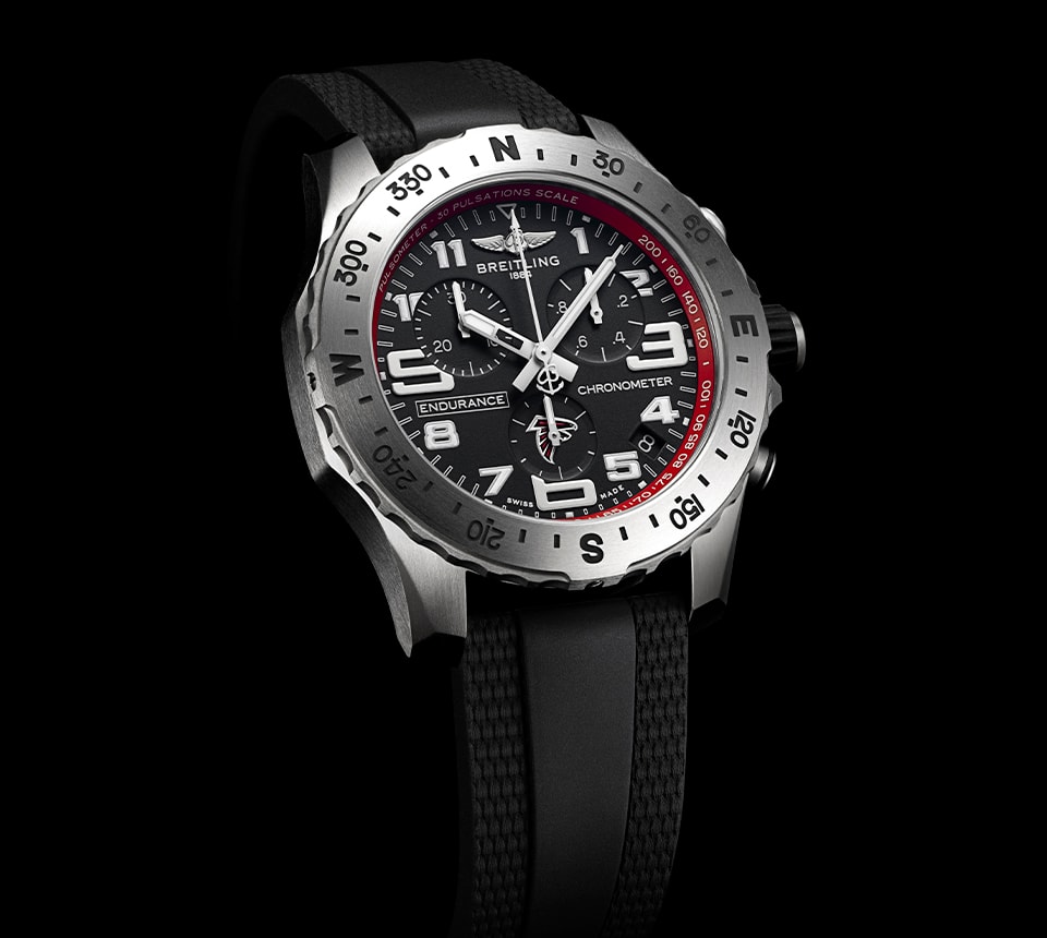 {generated} Breitling Endurance Pro Atlanta Falcons edition with black dial, red accents, and sport strap shown in close detail