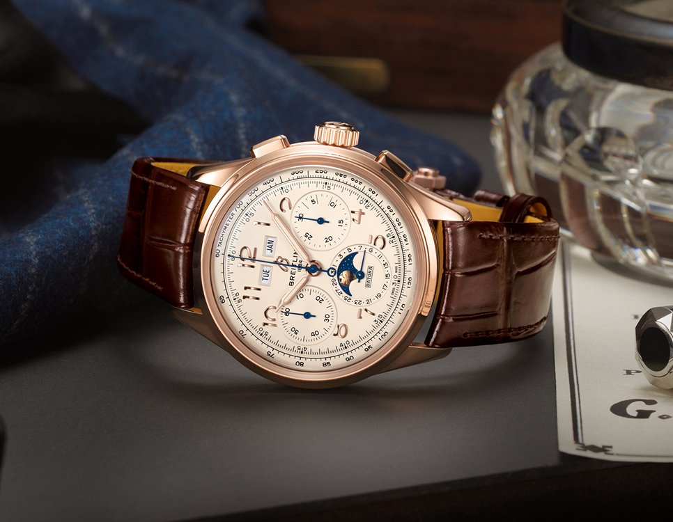 {generated} Breitling Premier watch with rose gold case and brown leather strap displayed on a refined desk with moonphase details