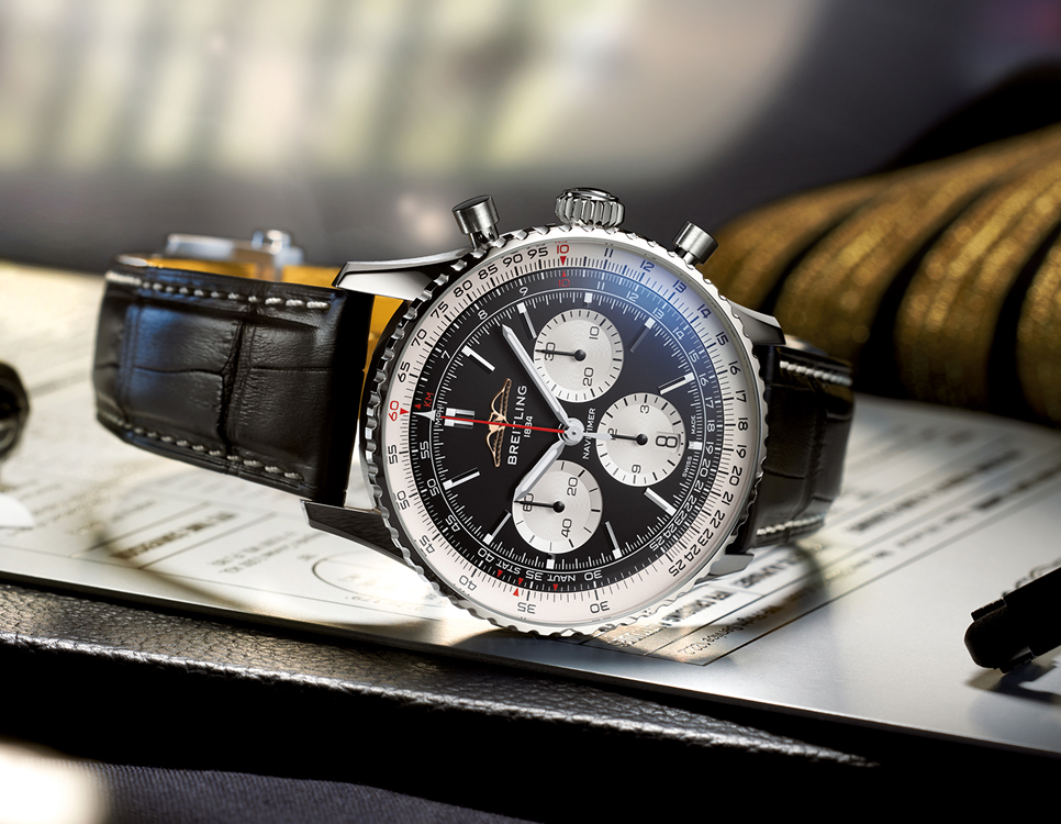 {generated} 航空書類に置かれたBreitling Navitimerで、黒い文字盤とクロノグラフ表示、レザーのストラップが際立つ。