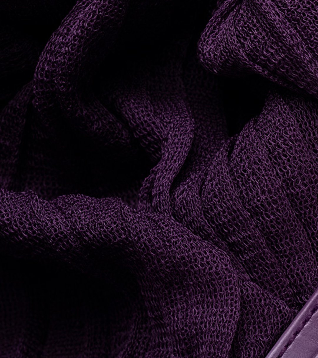 {generated} Breitling Lady Premier watch with a purple dial and leather strap displayed on rich textured violet fabric for a refined look