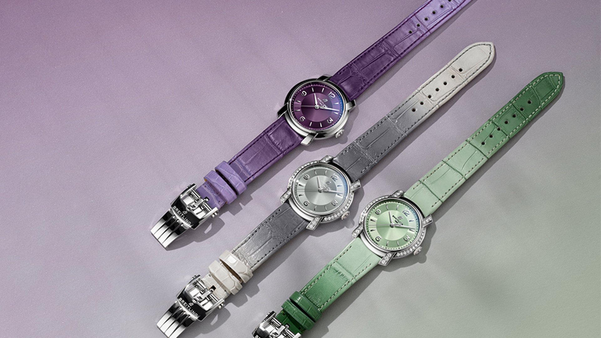 {generated} 紫・灰・緑のストラップを備えたBreitling Lady Premier女性用モデルが上品な文字盤と細部を際立たせる構成