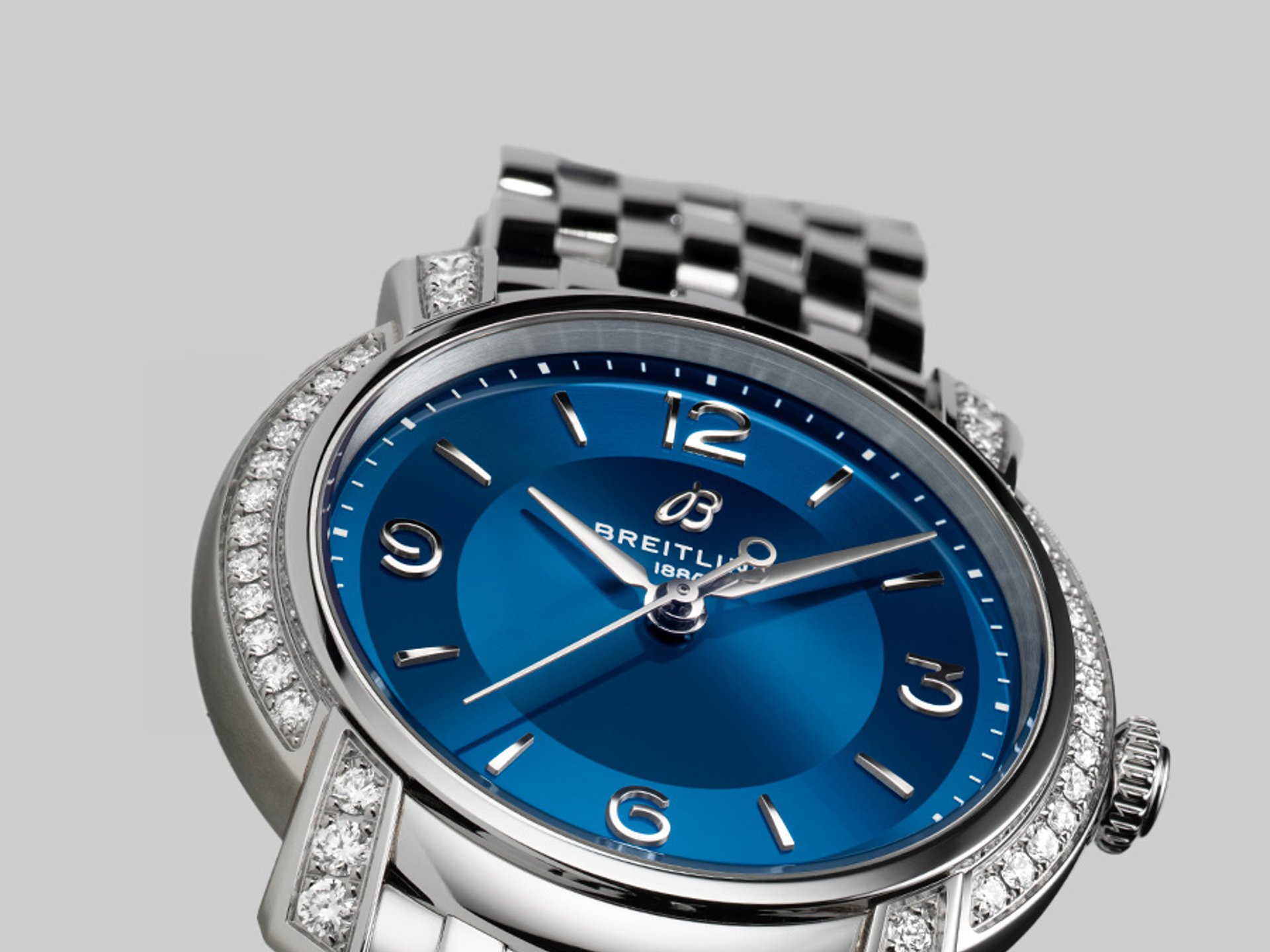 {generated} Breitling Lady Premier women’s watch with blue dial, diamond‑set bezel and polished bracelet shown in close detail