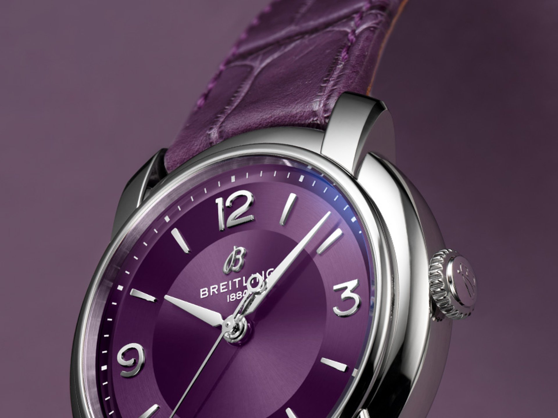 {generated} Breitling Lady Premier presented with a purple dial and matching leather strap, highlighting its polished steel case.
