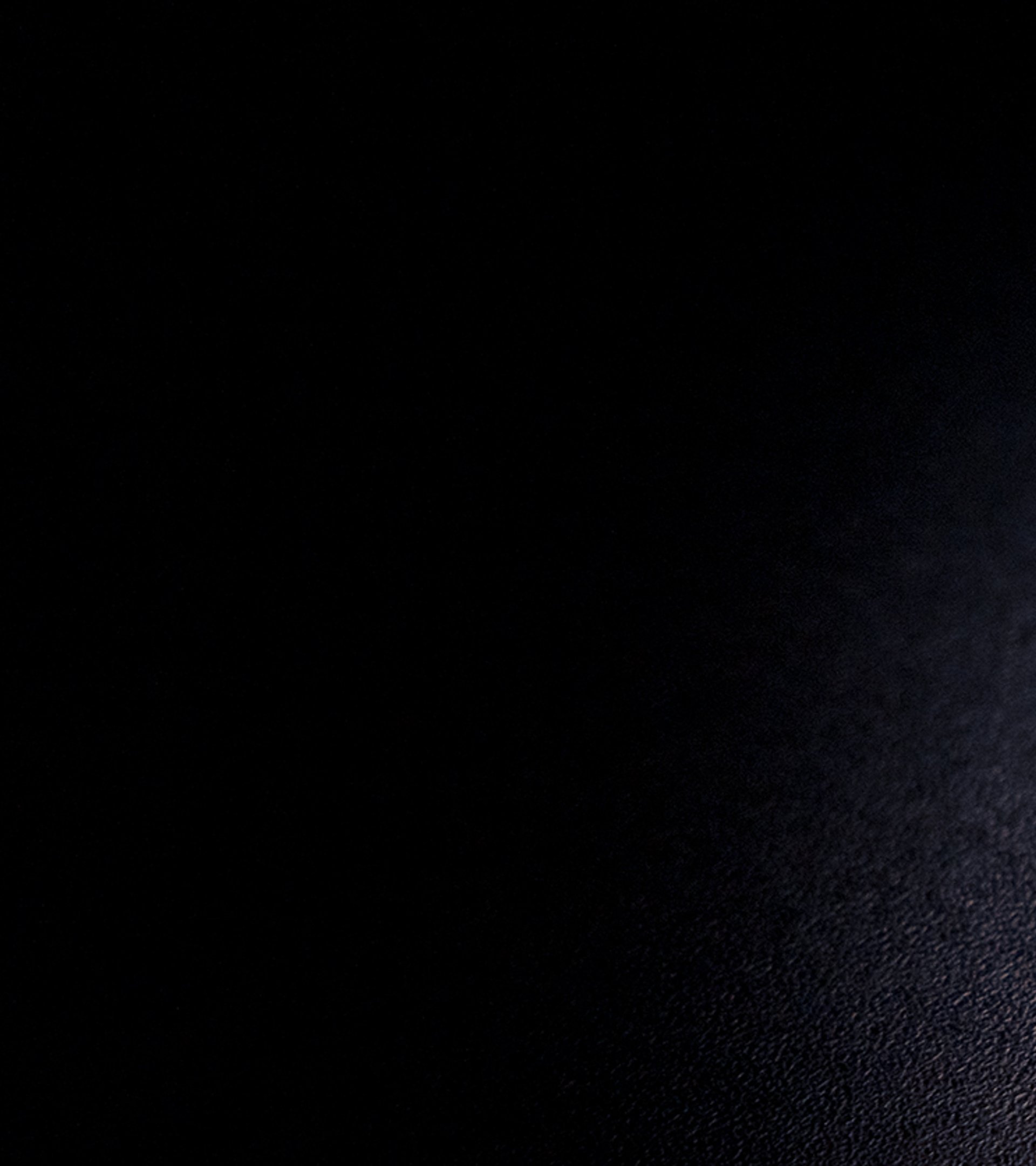 {generated} Breitling mechanical movement set on a dark surface, showcasing fine gears and refined Triumph‑inspired craftsmanship