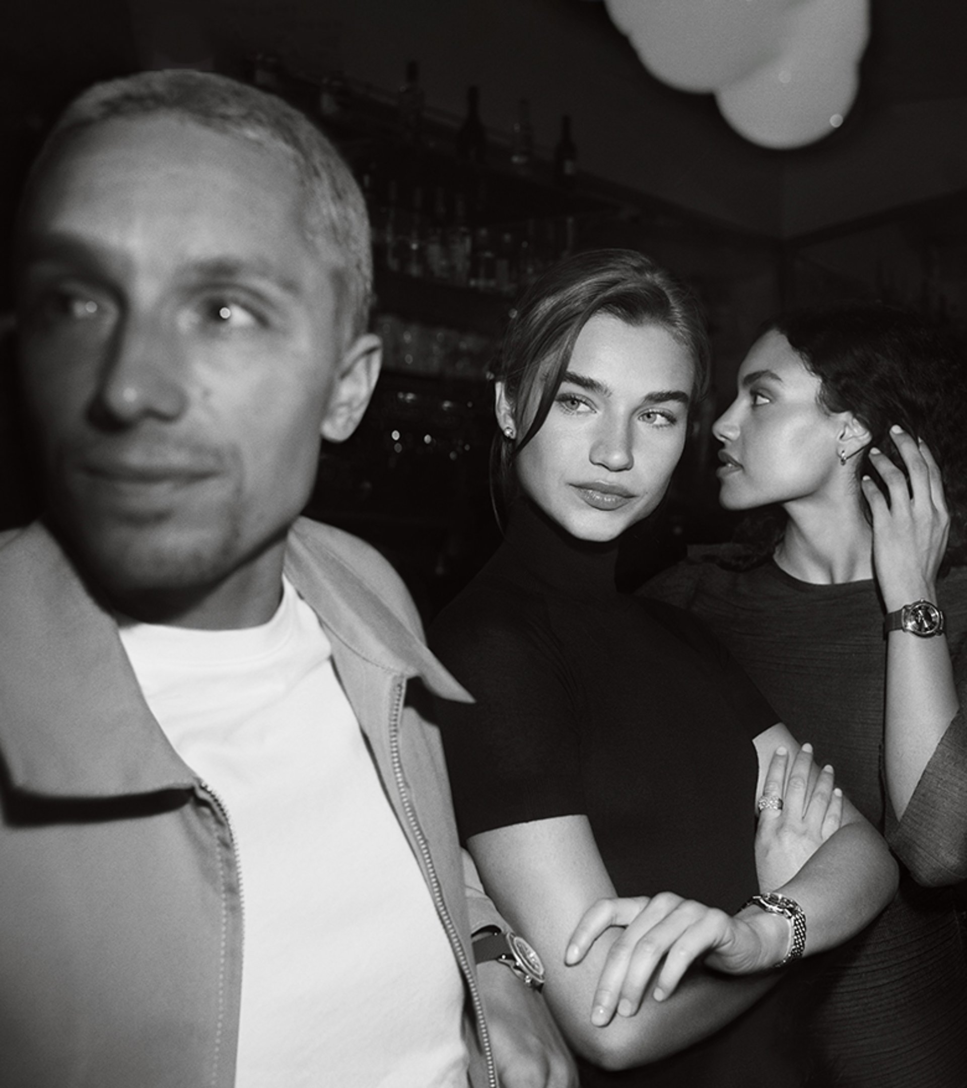 {generated} Women in an evening setting linking arms, showcasing the Breitling Lady Premier watch with elegant refined style.