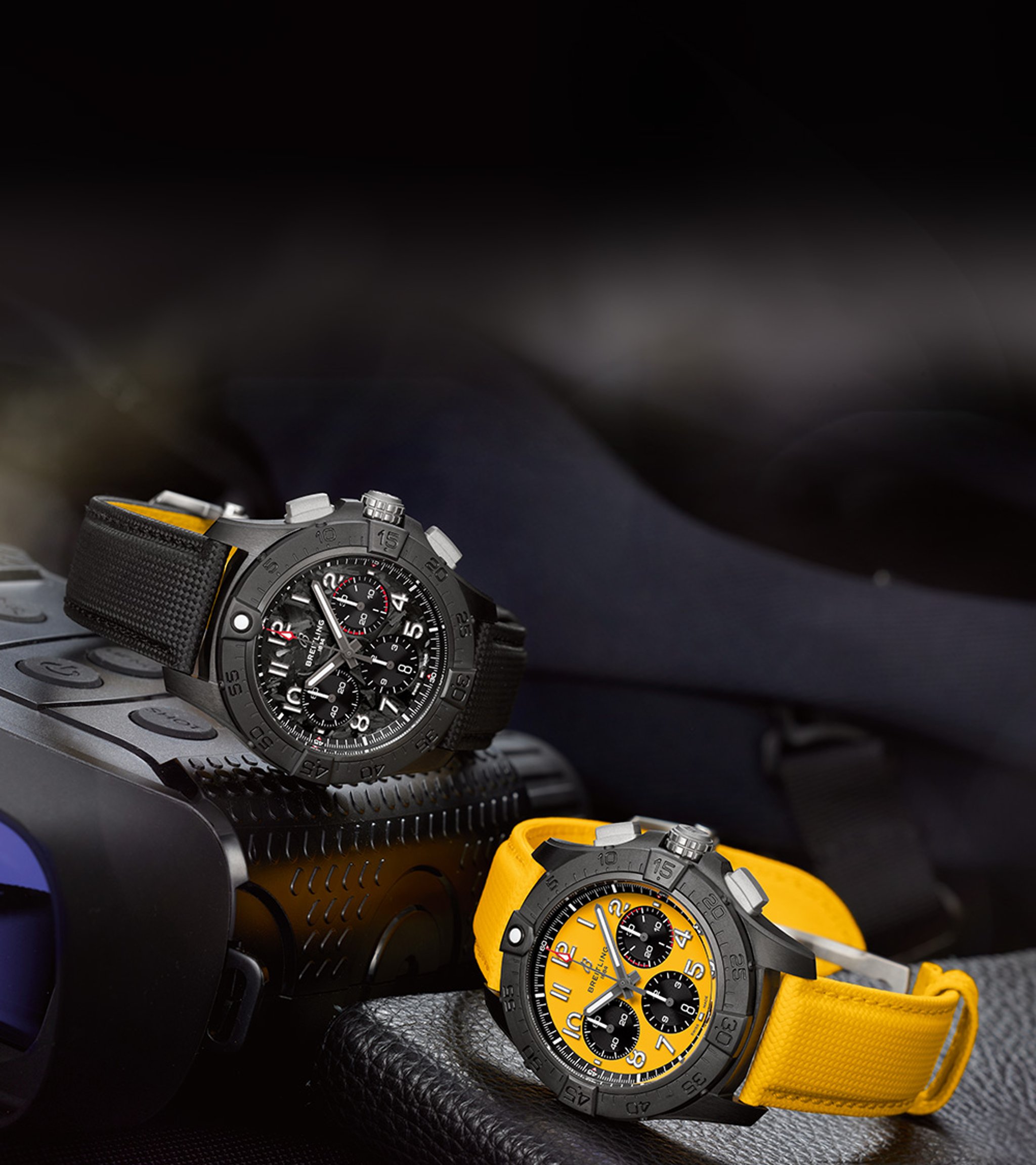 {generated} Breitling ceramic chronograph watches with black and yellow straps set on rugged field gear in a technical setting