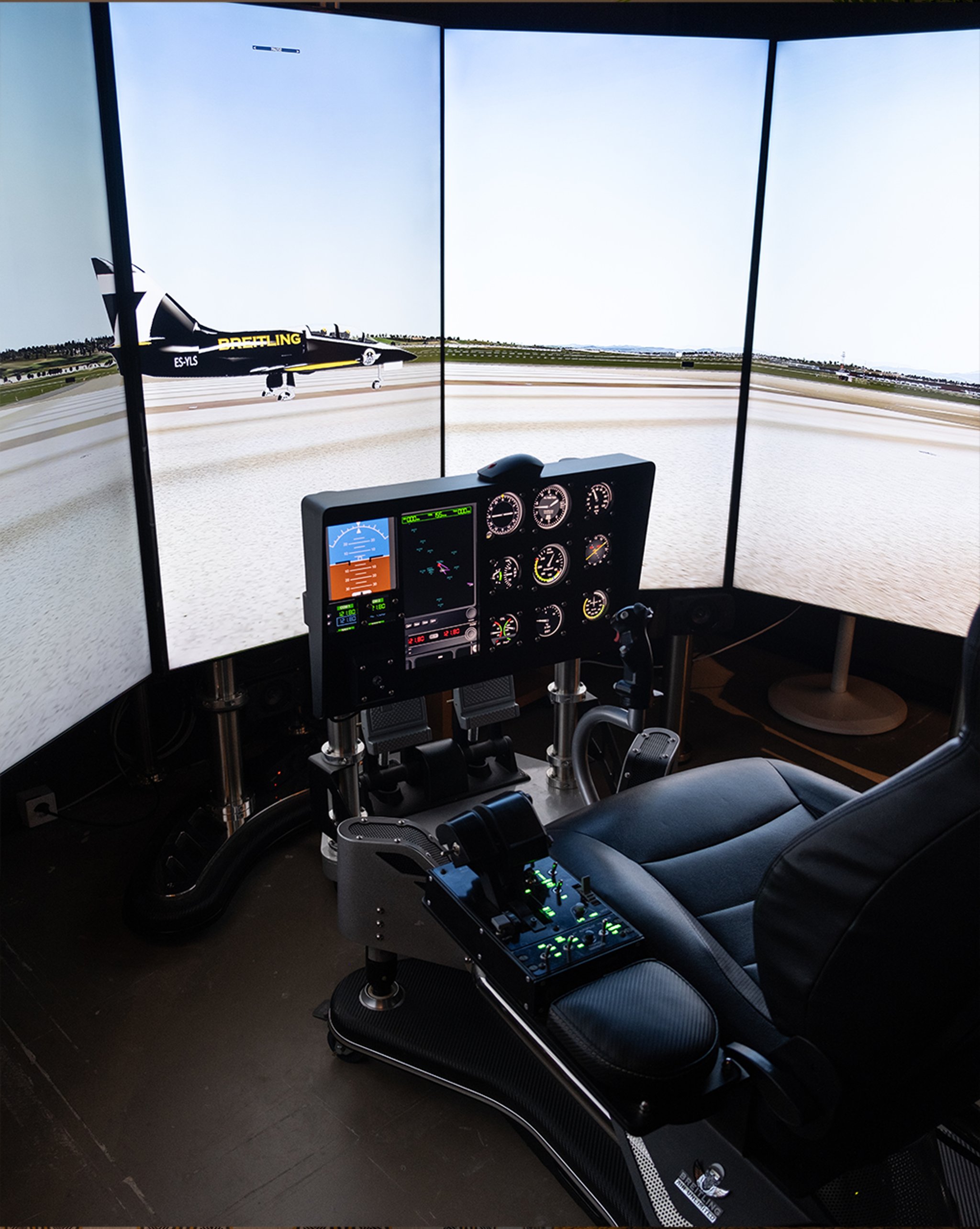 {generated} Advanced flight simulator setup displaying a Breitling-branded aircraft on panoramic screens with detailed cockpit controls