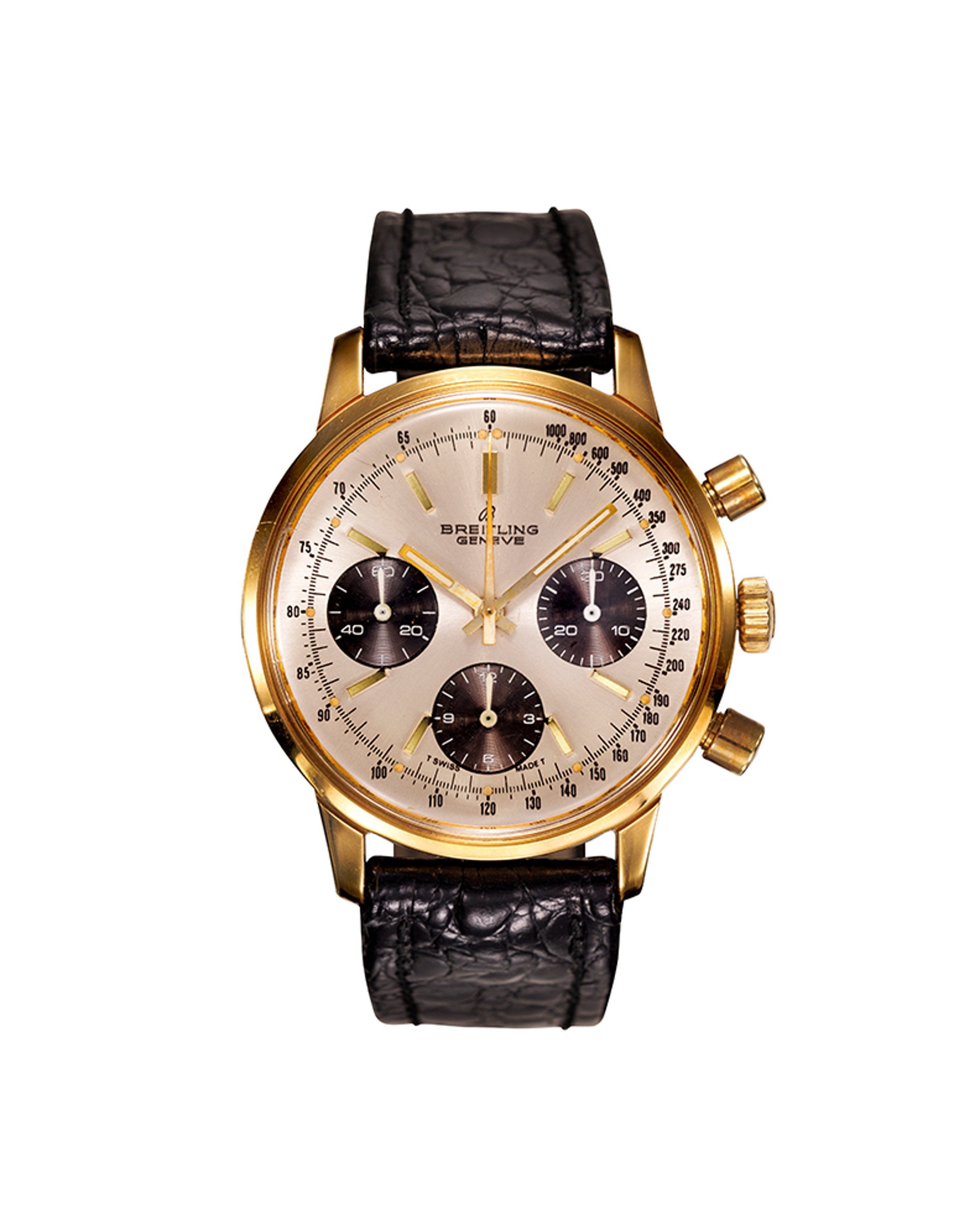 {generated} Breitling Top Time Long Playing ref. 815 配金色計時碼錶錶殼、深色小錶盤與黑色紋理皮革錶帶