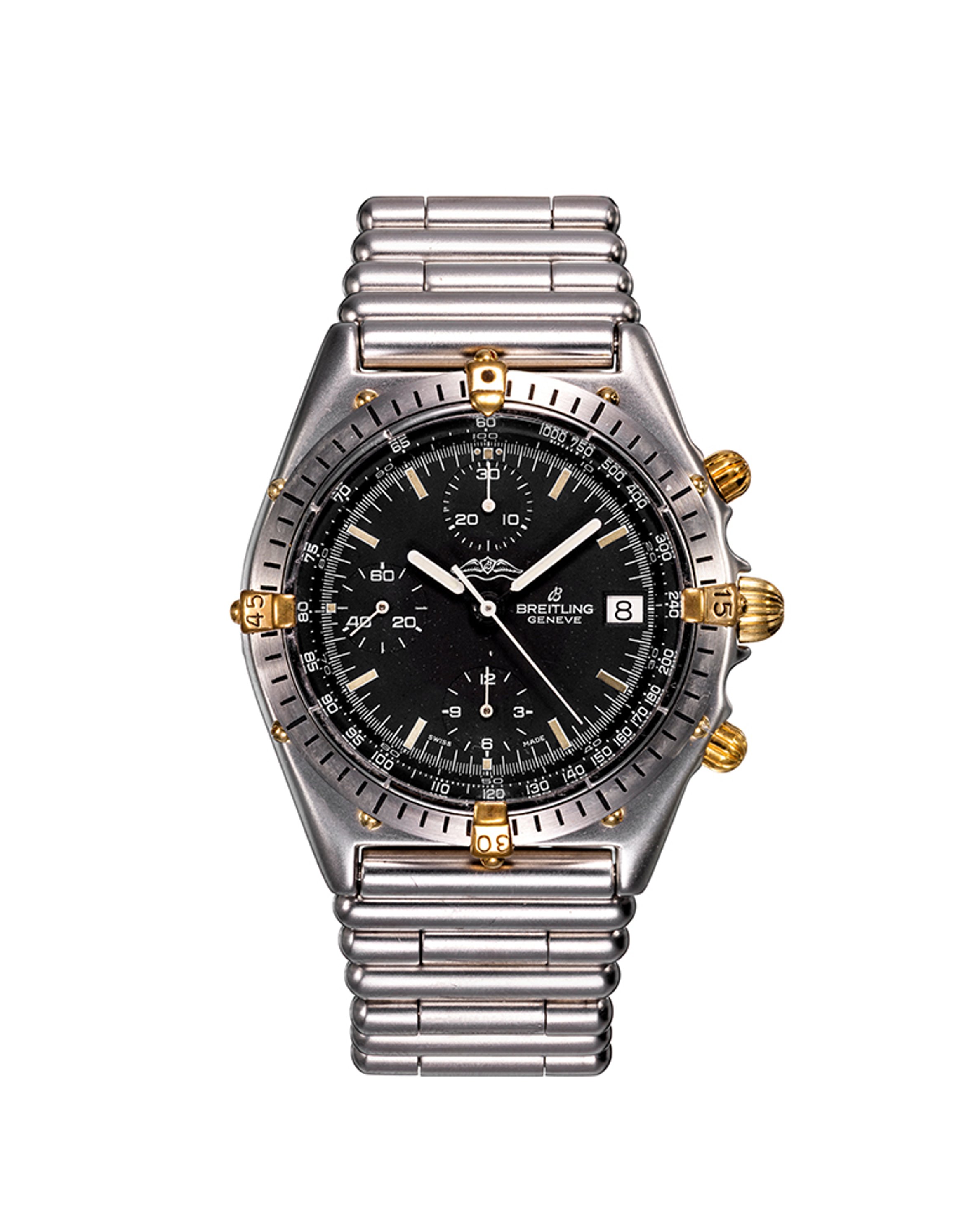 {generated} Breitling Chronomat réf.81950 V7750 avec cadran noir, bracelet acier et accents dorés soulignant son style de chronographe