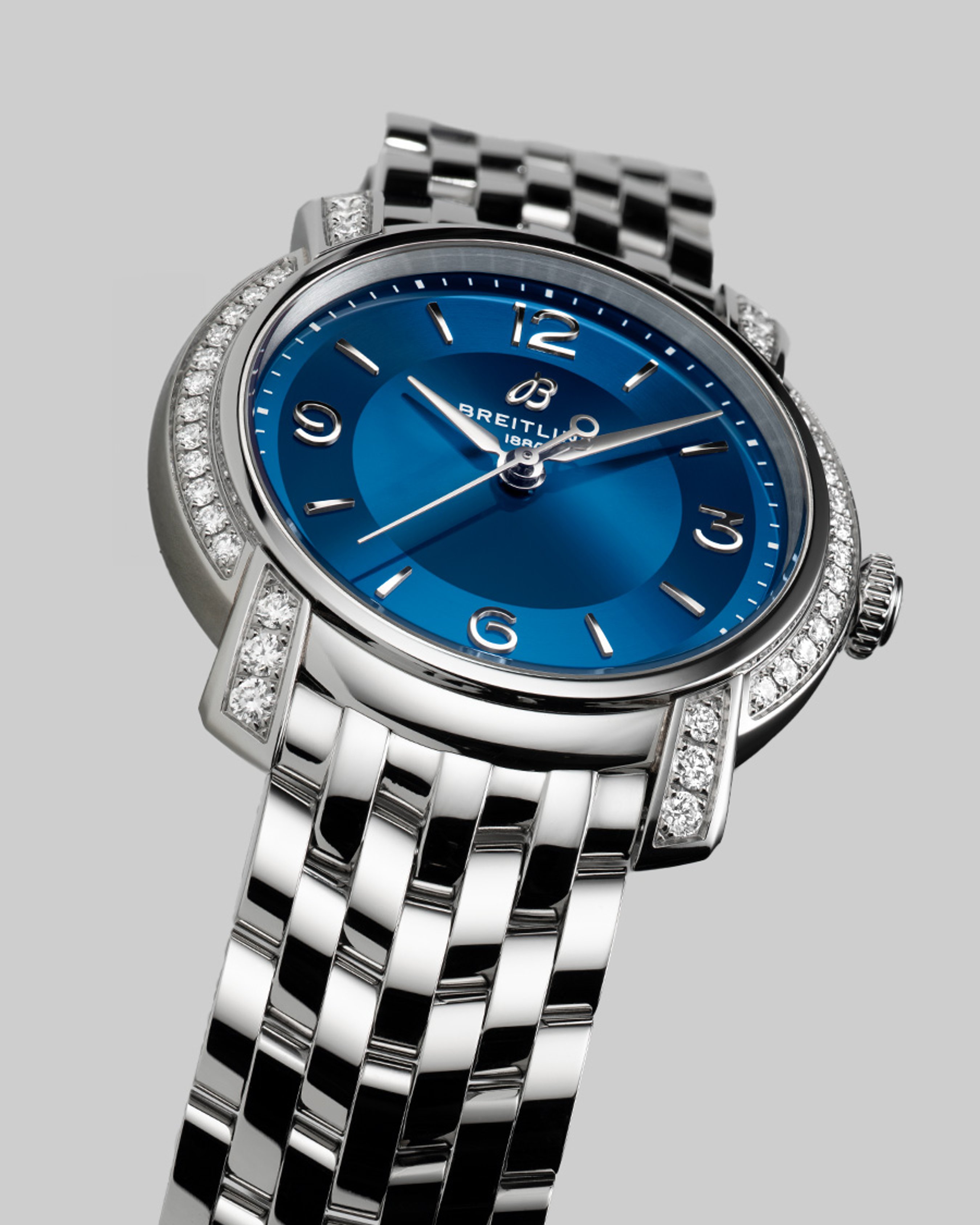 {generated} Breitling Lady Premier women’s watch with blue dial, diamond‑set bezel and polished bracelet shown in close detail