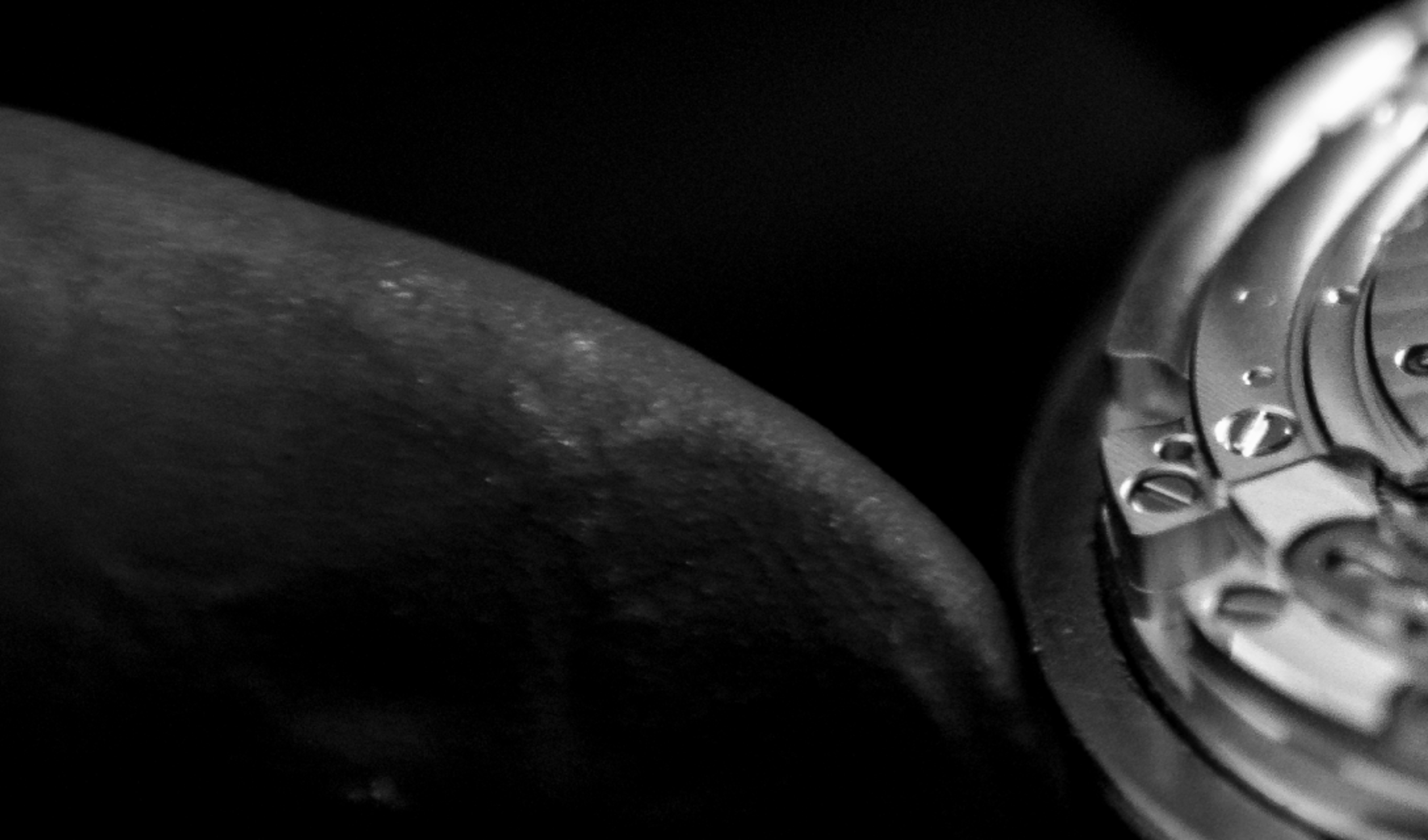 {generated} Close-up of a watchmaker adjusting a Breitling movement, highlighting intricate components and precise chronometry craft